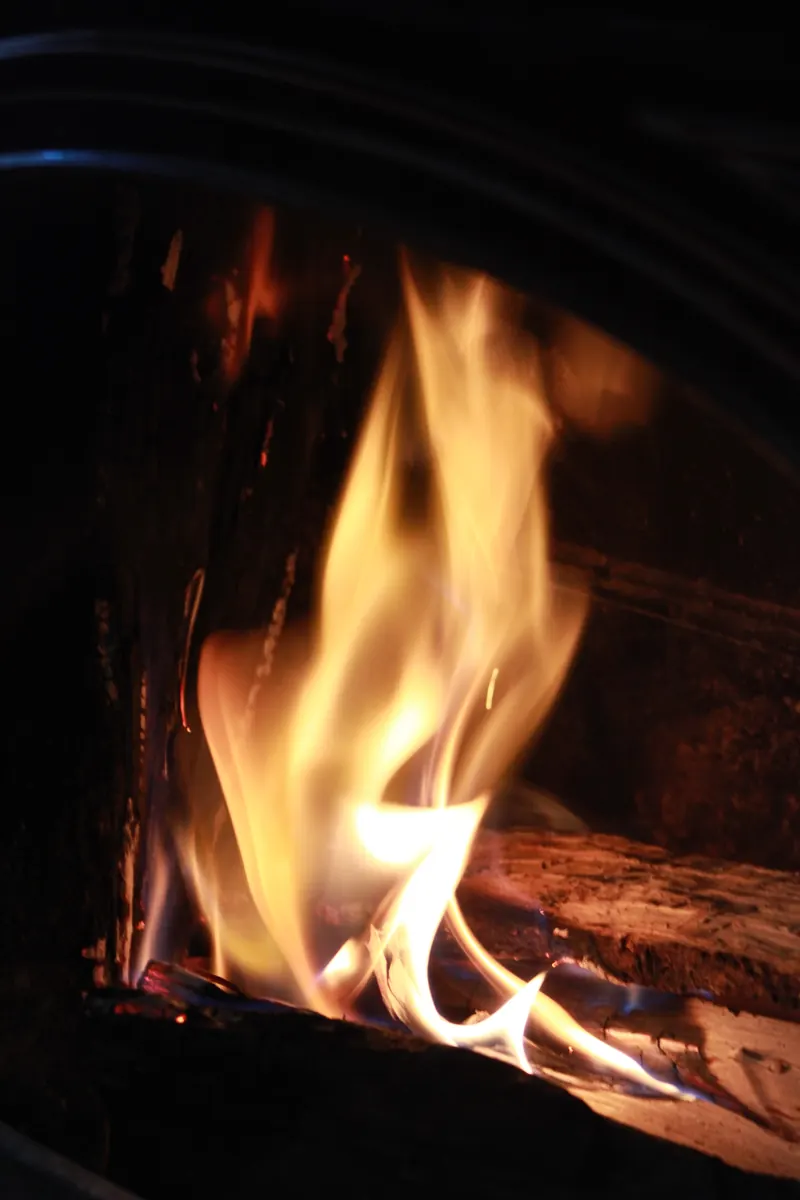 A fire burning in a fireplace